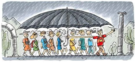 A tourist guide leading a group around an ancient site under a large umbrella on a rainy day